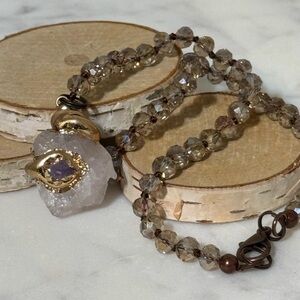 16” beaded necklace quartz encased in gold, with a touch of amethyst